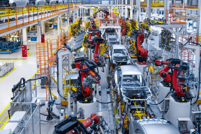 assembly-line-production-new-car-automated-welding-car-body-production-line-robotic-arm-car-production-line-is-working (1)
